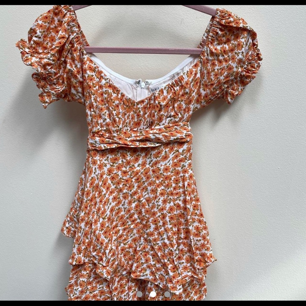 orange flowy floral romper